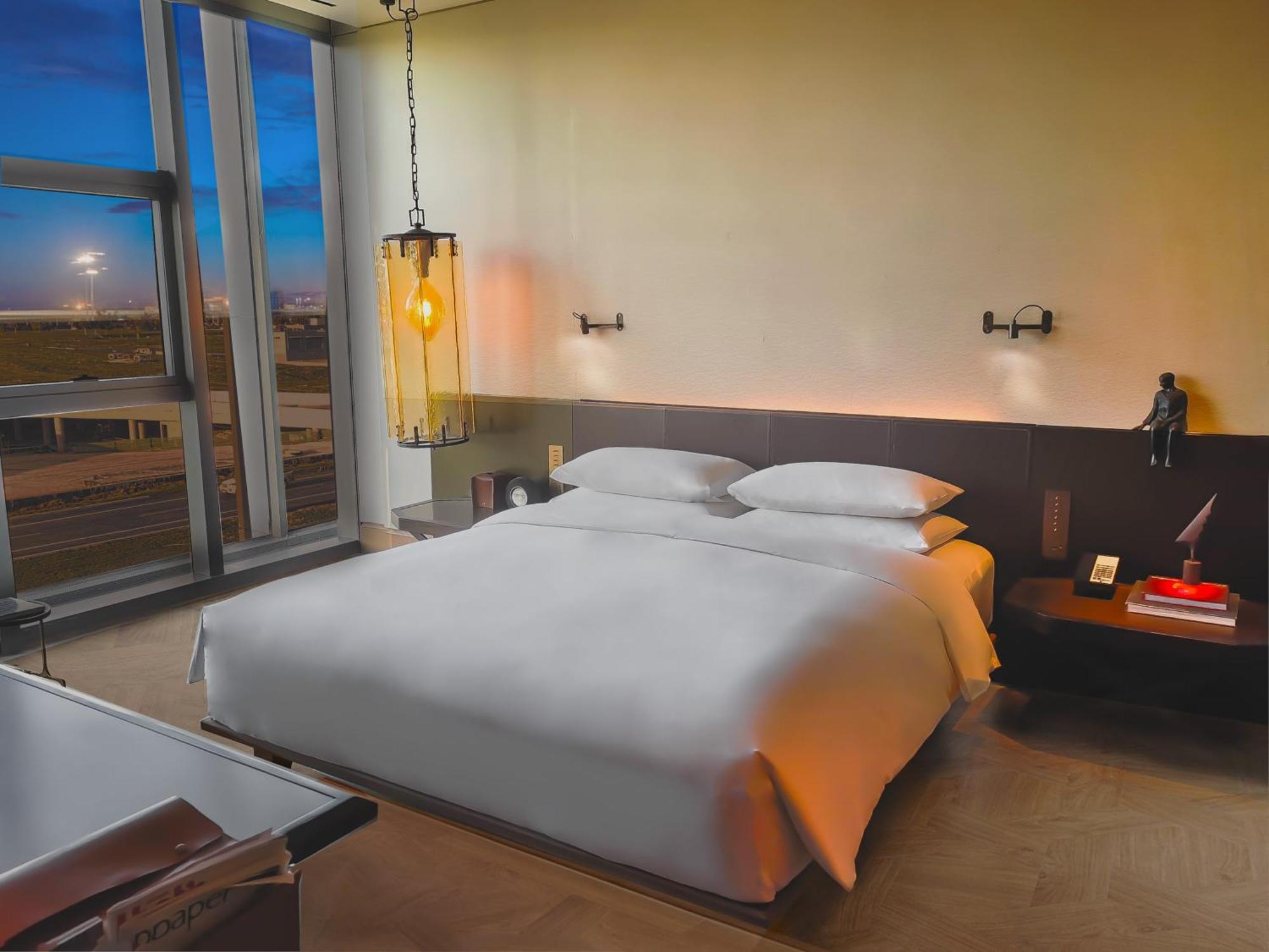 Hotel Mumian Beijing Daxing International Airport, Part Of Hyatt Esterno foto A bedroom at the hotel